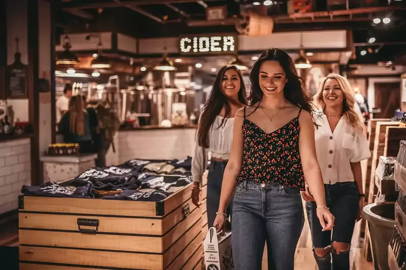 A group of friends at Tennessee Cider Company in Gatlinburg, Tennessee